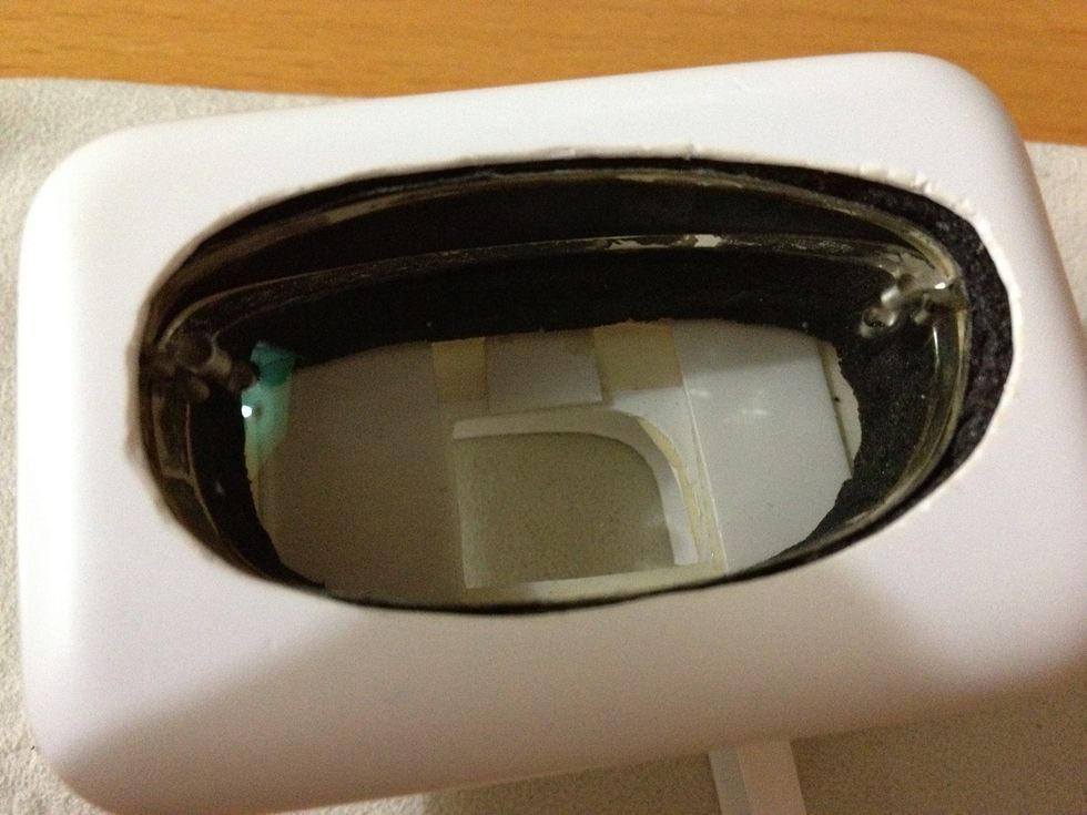 Make a case to hold the lenses. There're various ways to make the case but I found these materials at home and made do of them: hard black foam and an iPad box with its plastic insert.