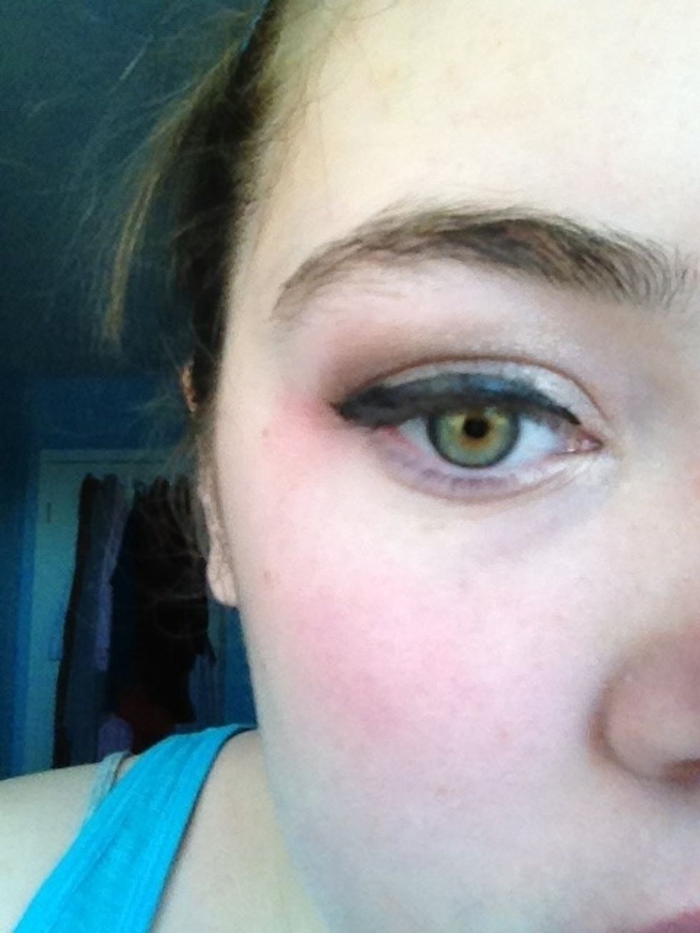 Make a cat eye to the best of your ability ( I'm terrible with it)