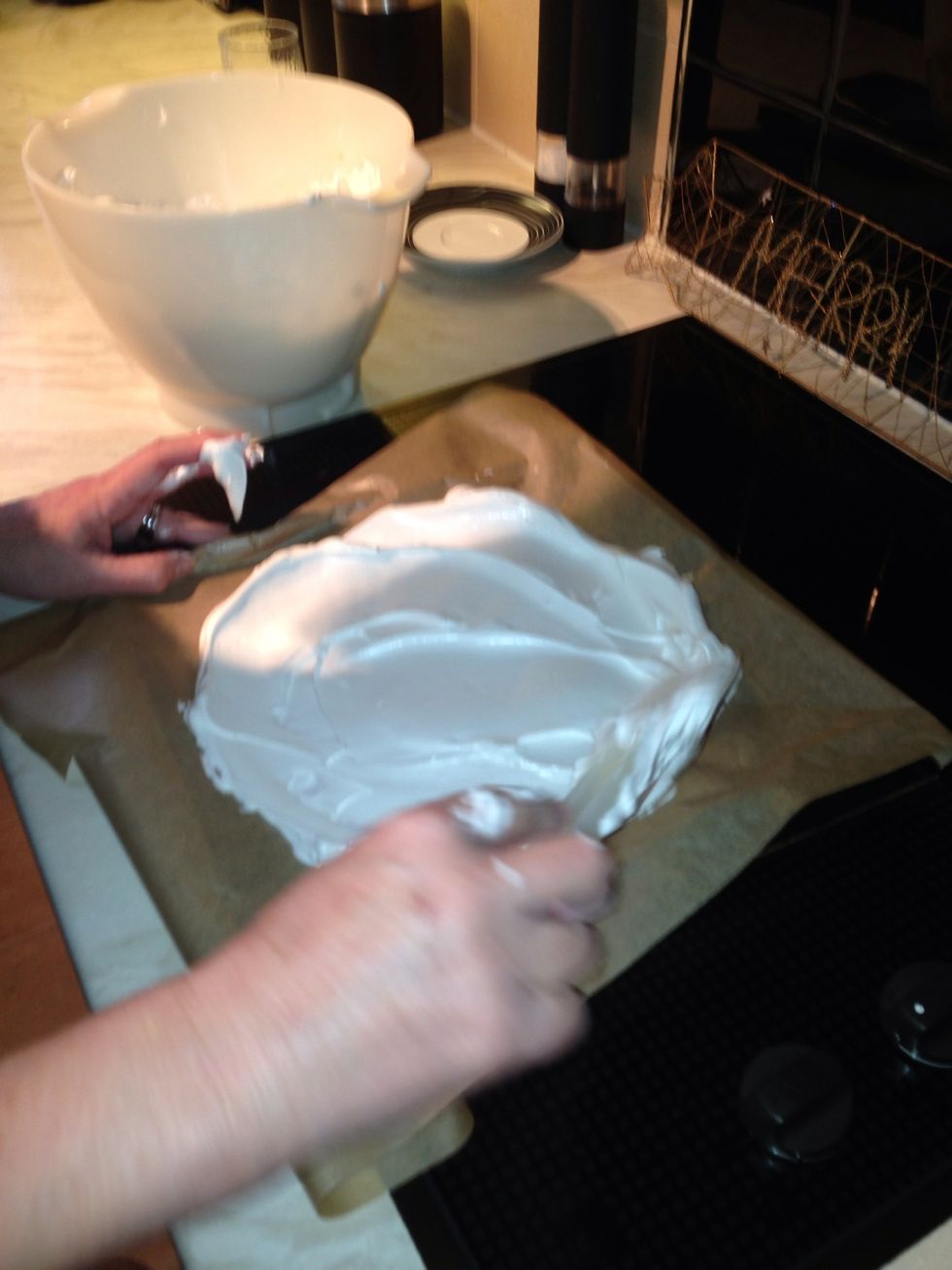 Make a circle out of the mixture onto a tray lined with grease proof paper.
