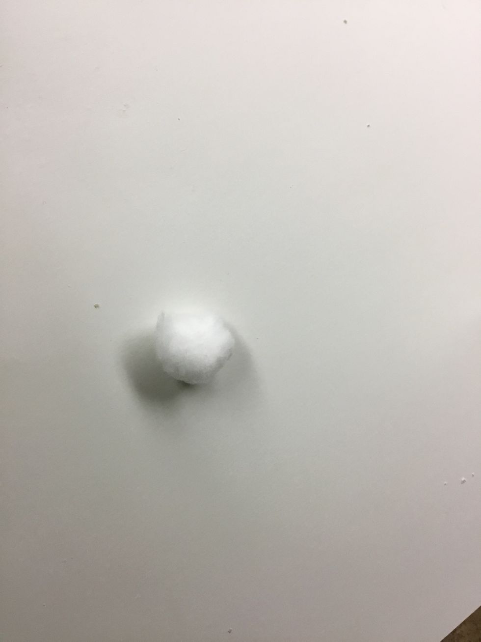 Make a cotton ball into a smaller ball and stick it into your friend ear