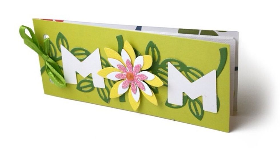 Make a coupon book for mom and dad. For example; clean up table,free hug,etc