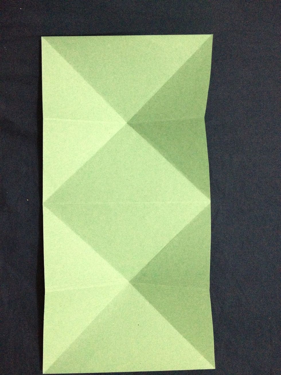 Make a crease at middle of both squares