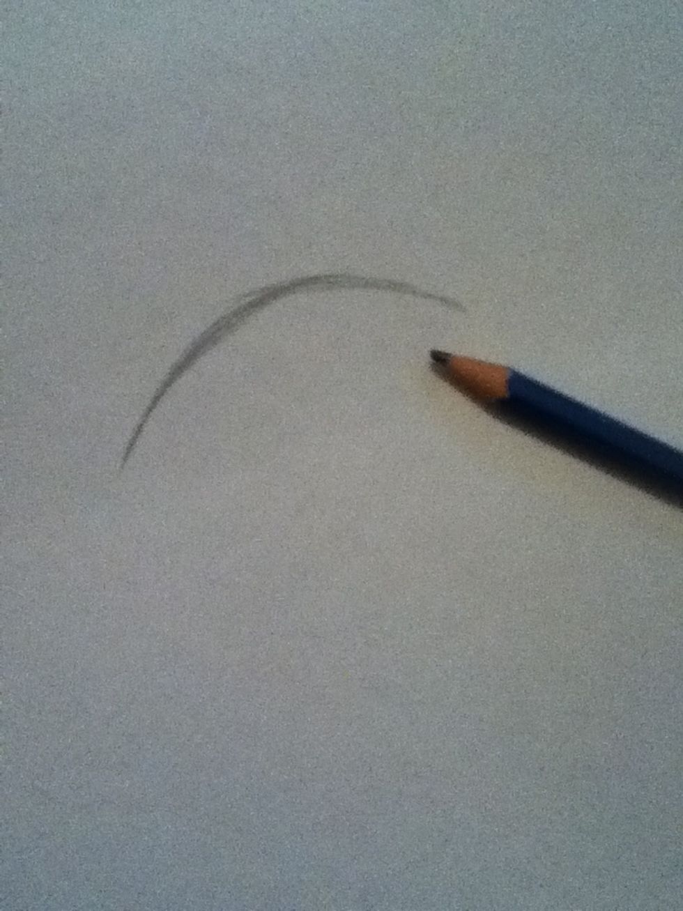 Make a curved line. Make it bigger or smaller, depending on how big you want your eye to be.