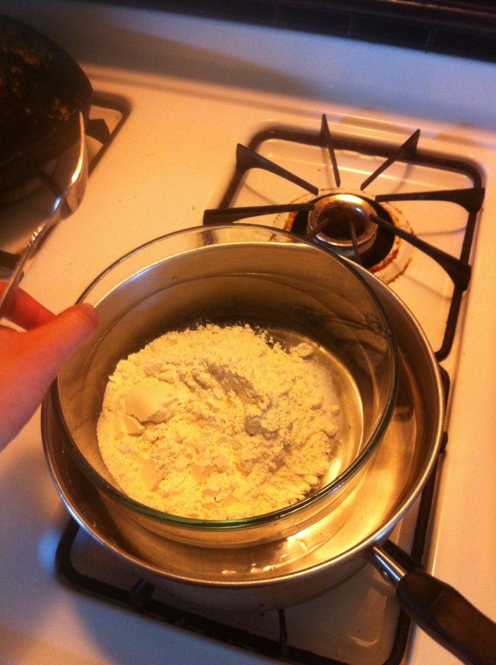 Make a double boiler by putting a bowl into a pot with a couple of inches of water. (I realized I needed to take it out to mix in the water in after taking this photo)