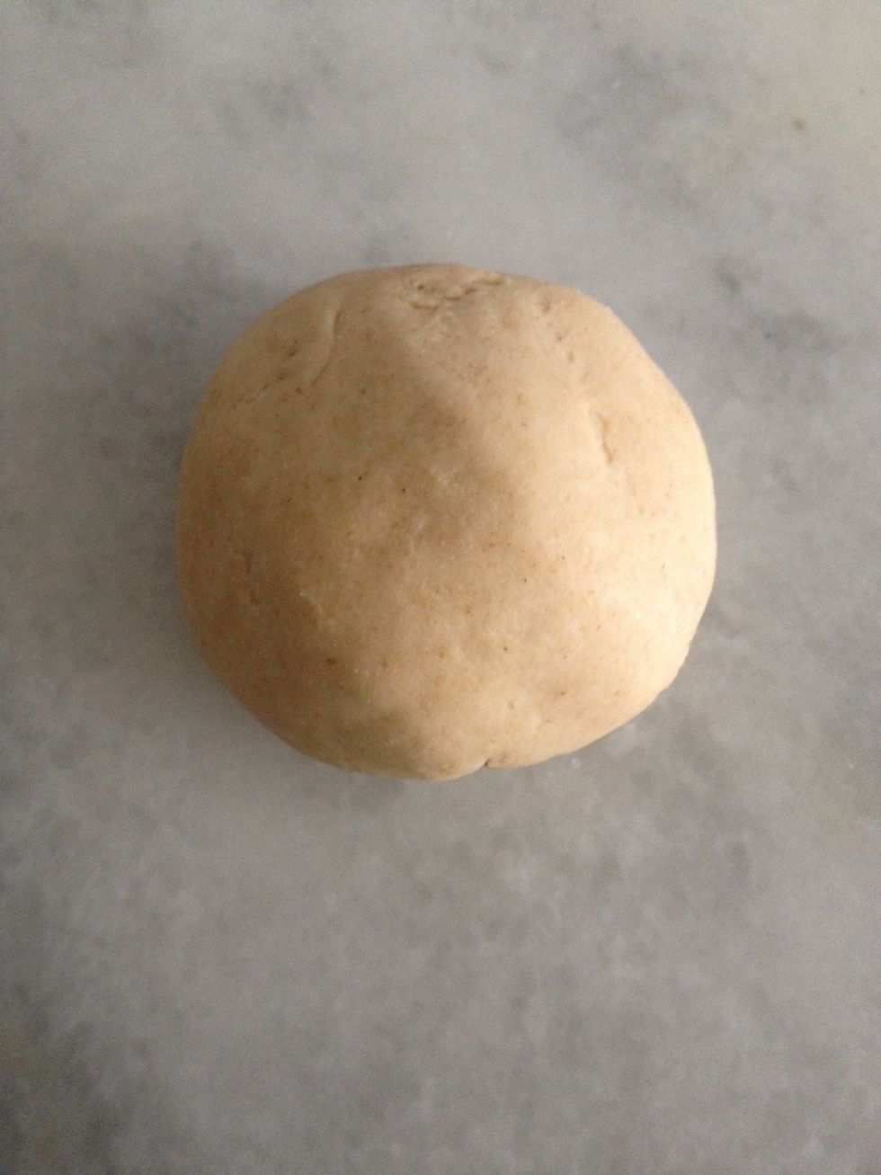 Make a dough using salt, water and wheat floor and take a lemon size ball to roll