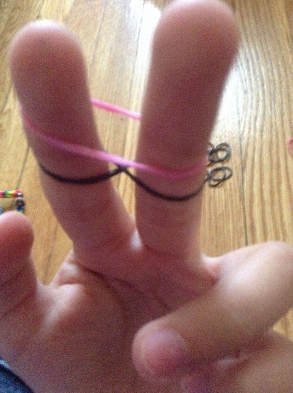 Make a figure 8 on the first one you put on your finger