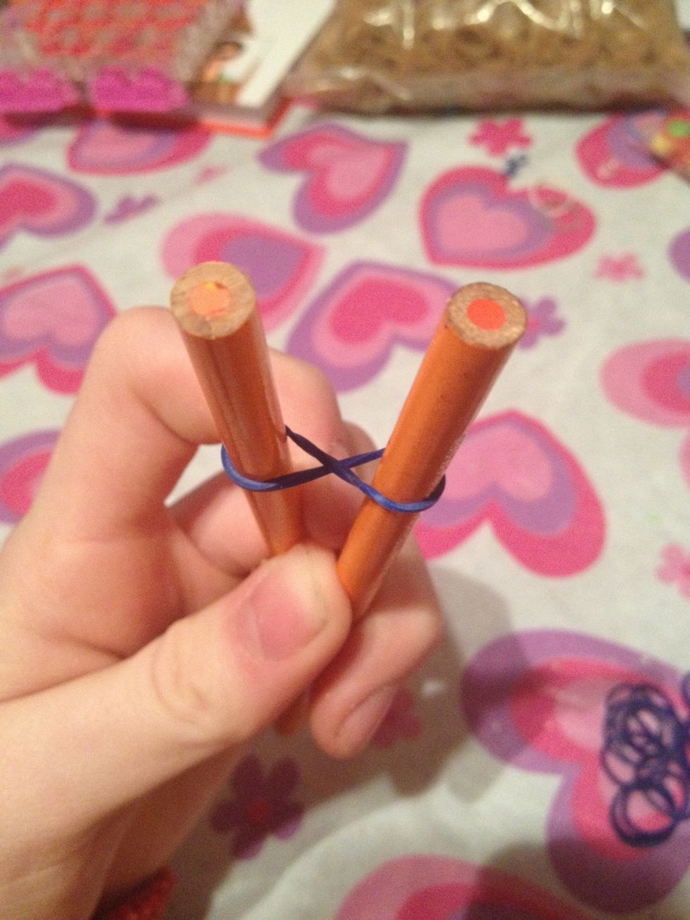 Make a figure 8 with the first elastic