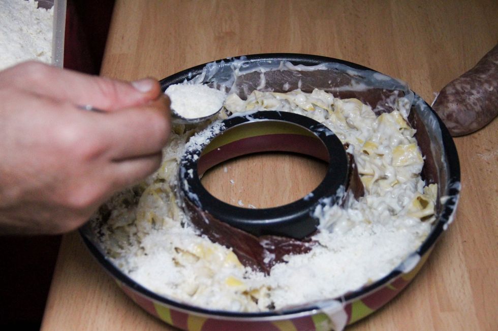 Make a first layer and the  add a layer of parmesan cheese