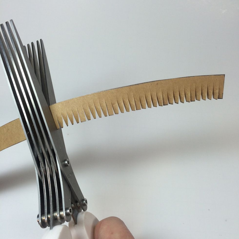 Make a fringed edge by making lots of little snips with scissors (or fringe scissors if you have them).