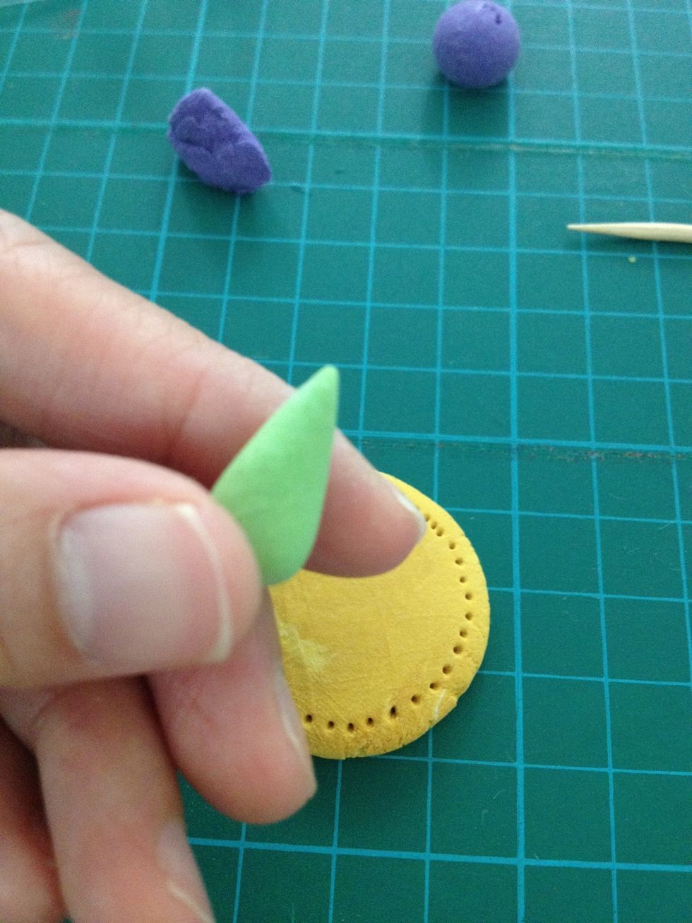 Make a green water drop.