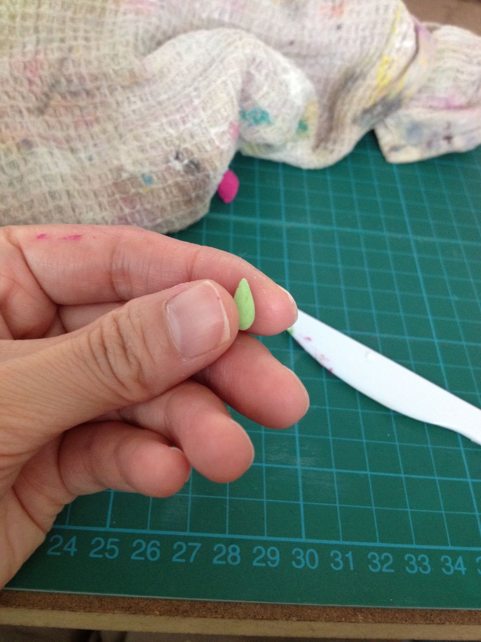 Make a green water drop.