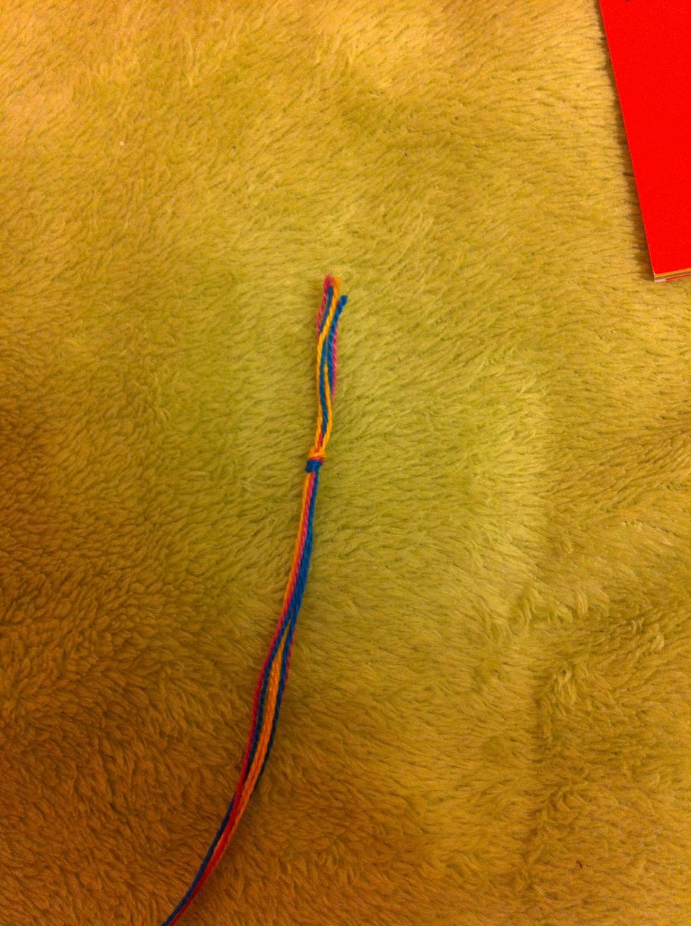 Make a knot about an inch down