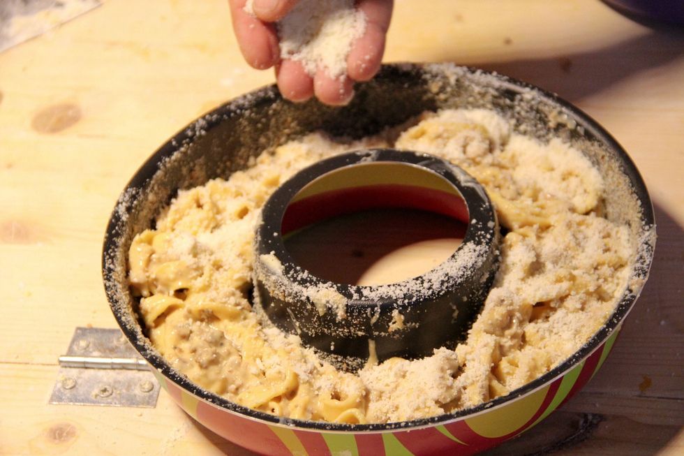 Make a layer of parmesan cheese