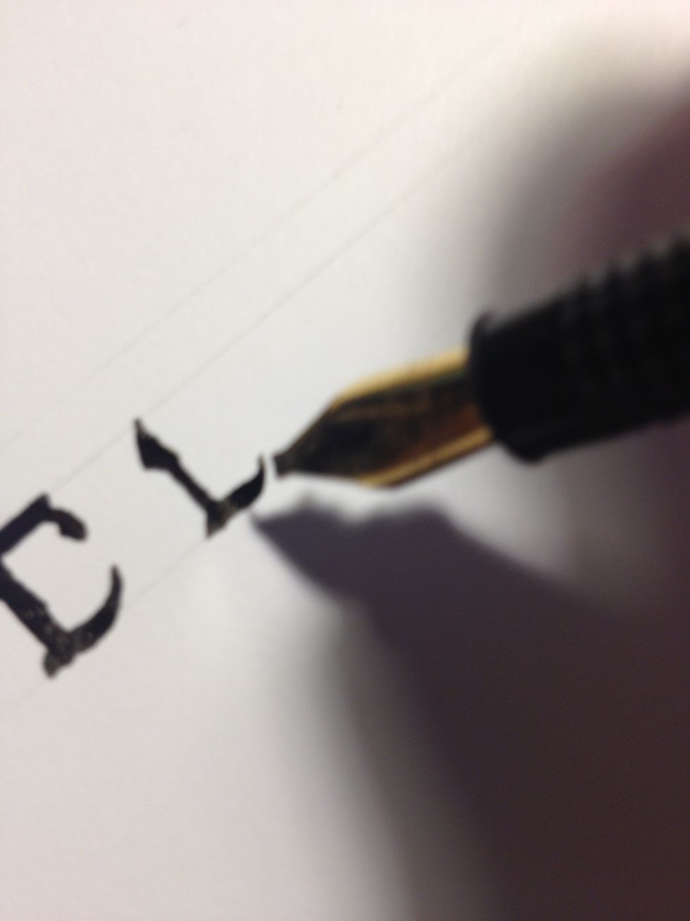 Make a line across the bottom line, curving upward slightly at the end.