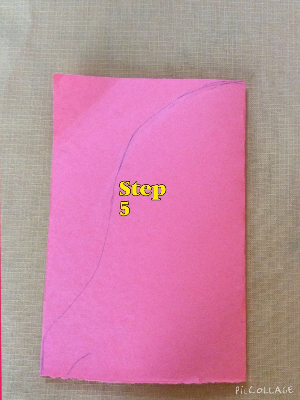 Make a little curve to the arch and bring it down to make it look like  3/4 of a slanted trapezoid.