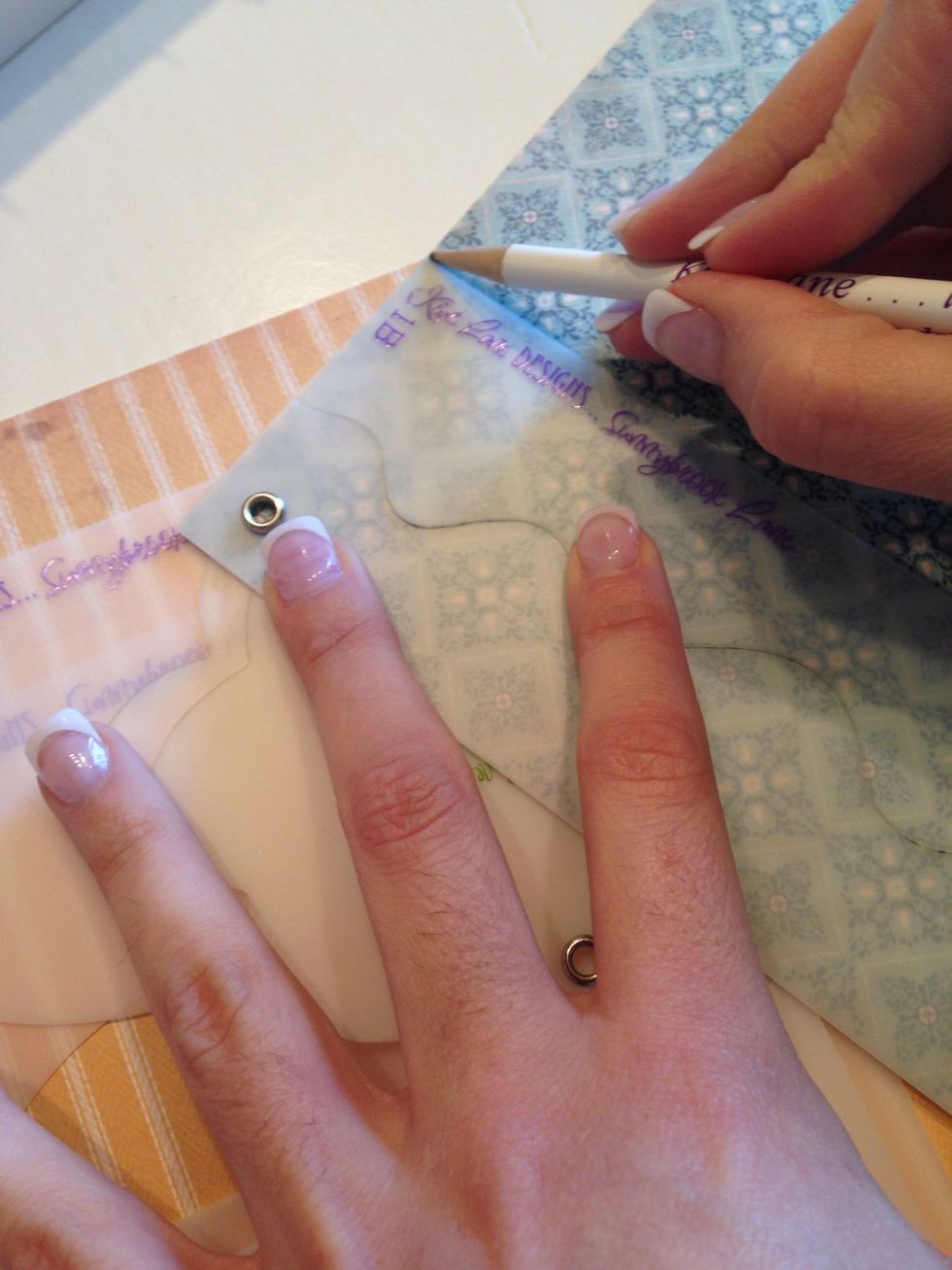 Make a little mark at the edge of the template. This is going to let you know where to do a straight cut with your paper trimmer.