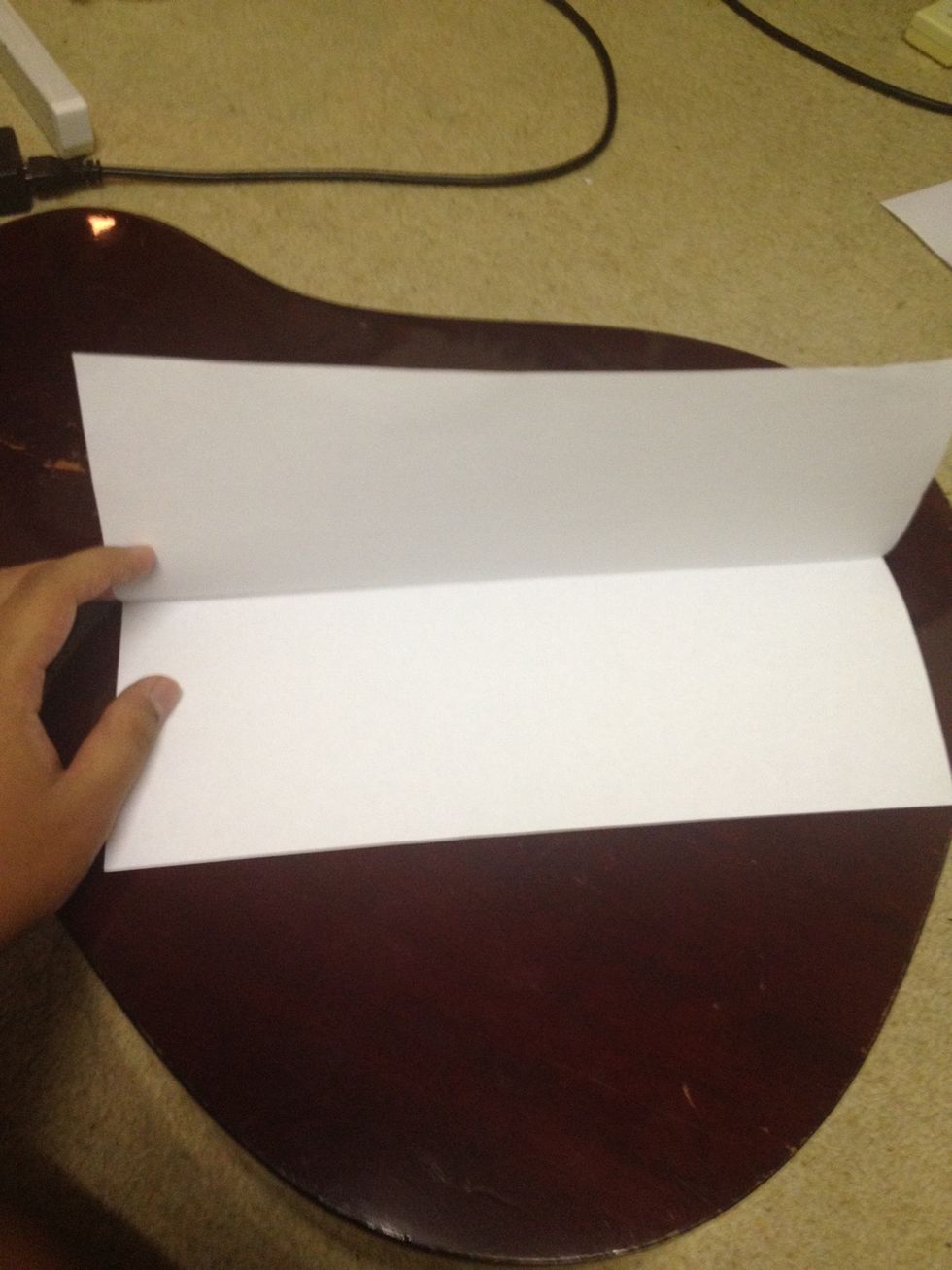 Make a long line by folding the paper in half. Fold them evenly. U can use any kind of "rectangular"paper. U can actually use a dollar bill for this and make it fly. :) flying money... Aaahhh,.\ud83d\ude32\ud83d\ude32\ud83d\ude32