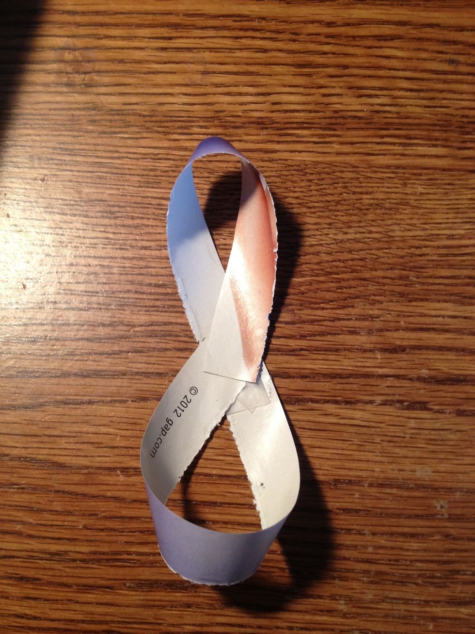 Make a loop like this with all the strips, except the last one.