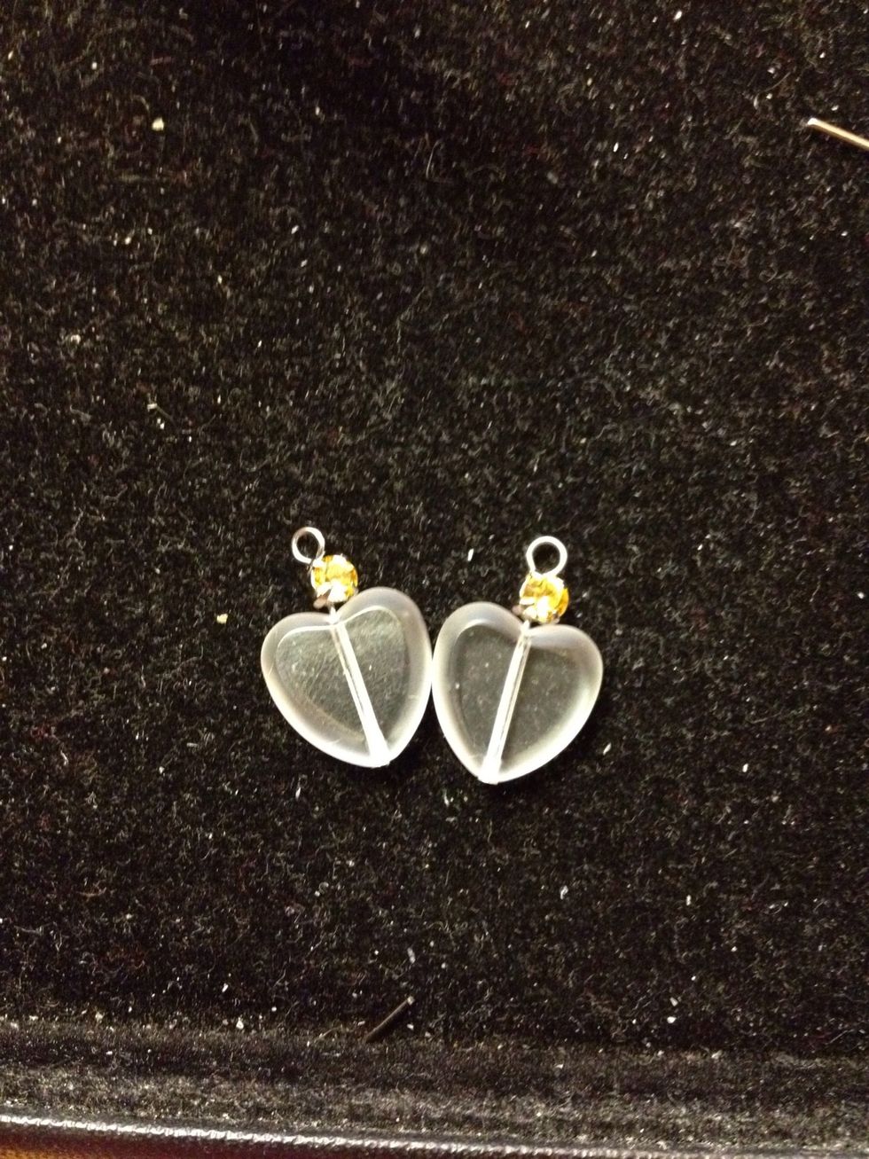 Make a loop to complete the dangle. Refer to http://myangelnow.blogspot.com/2011/05/early-spring-swarovski-crystal-earring.html?m=1 for how to make the loop.