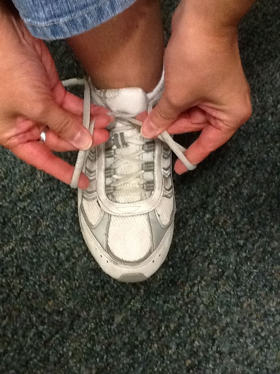 Make a loop with the other lace.