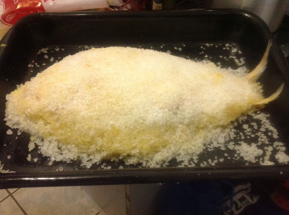 Make a mixture using rough kosher sea salt. I've used just over 1kg of salt. Crack in two whole eggs. You can use the egg whites, whisk until peaks form then add into salt. I used the egg with yolks.