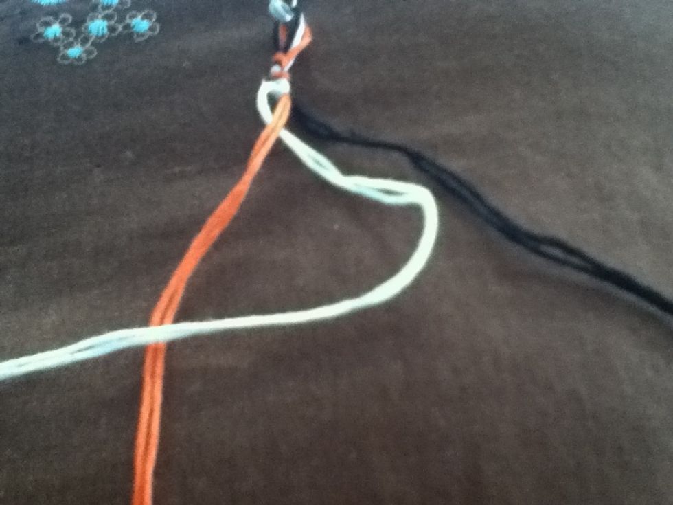 Make a "p" shape with your left thread.