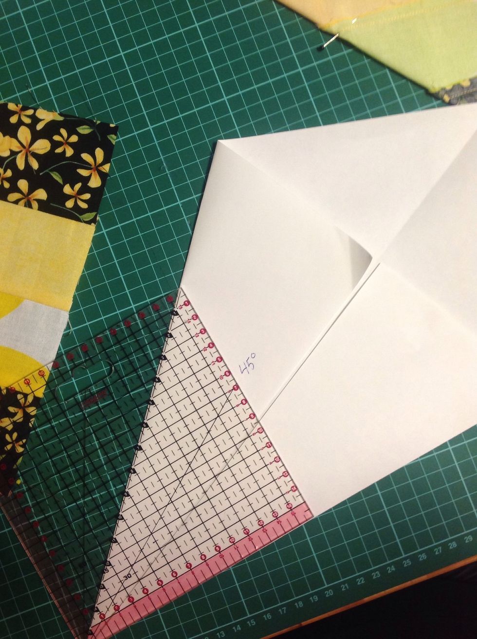 Make a pattern from paper. Make sure the angle is 45*.
