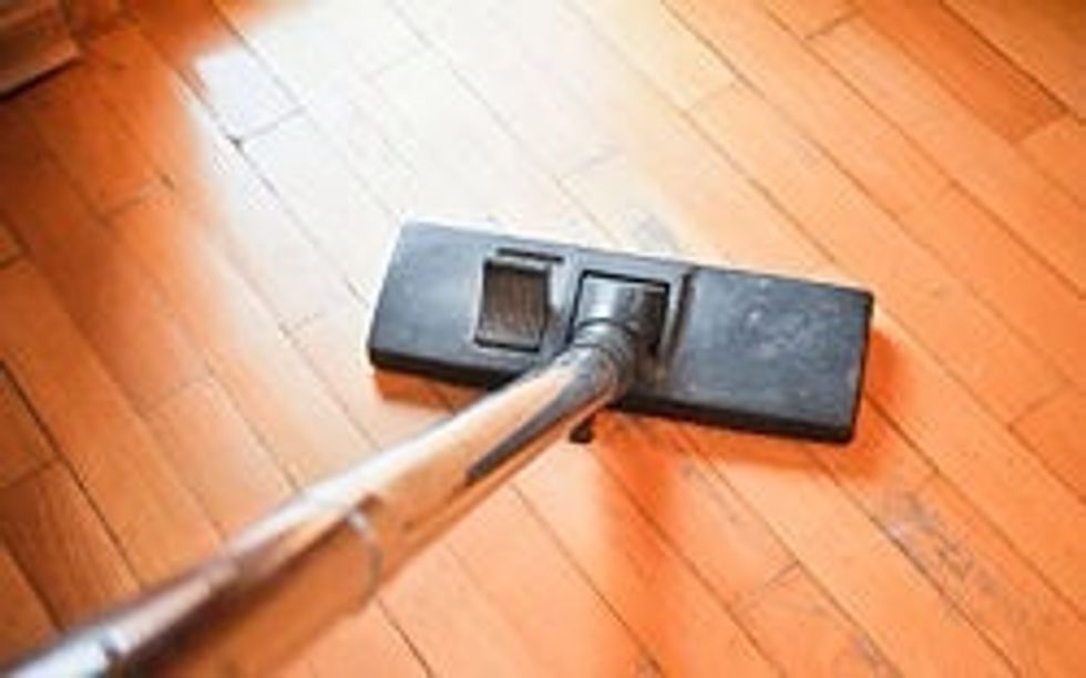Make a plan. Vacuum after you dust, otherwise the dust will settle and you'll have to do it again. Nothing will give a better impression of a clean room than freshly-vacuumed rugs.
