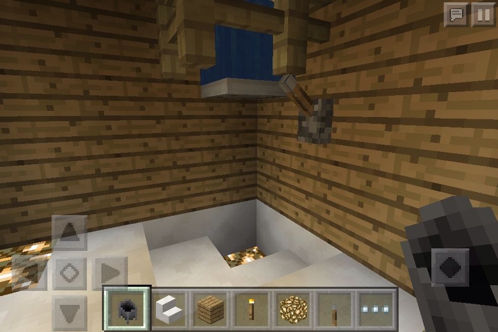 Make a shower with a trapdoor, fence, and slabs