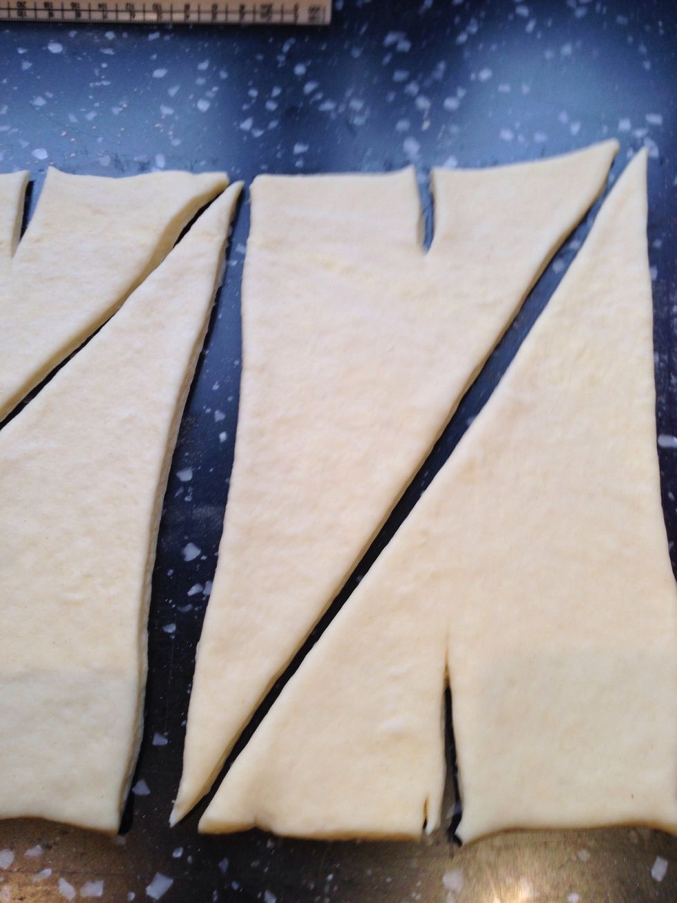 Make a slit a the base of each of the triangles