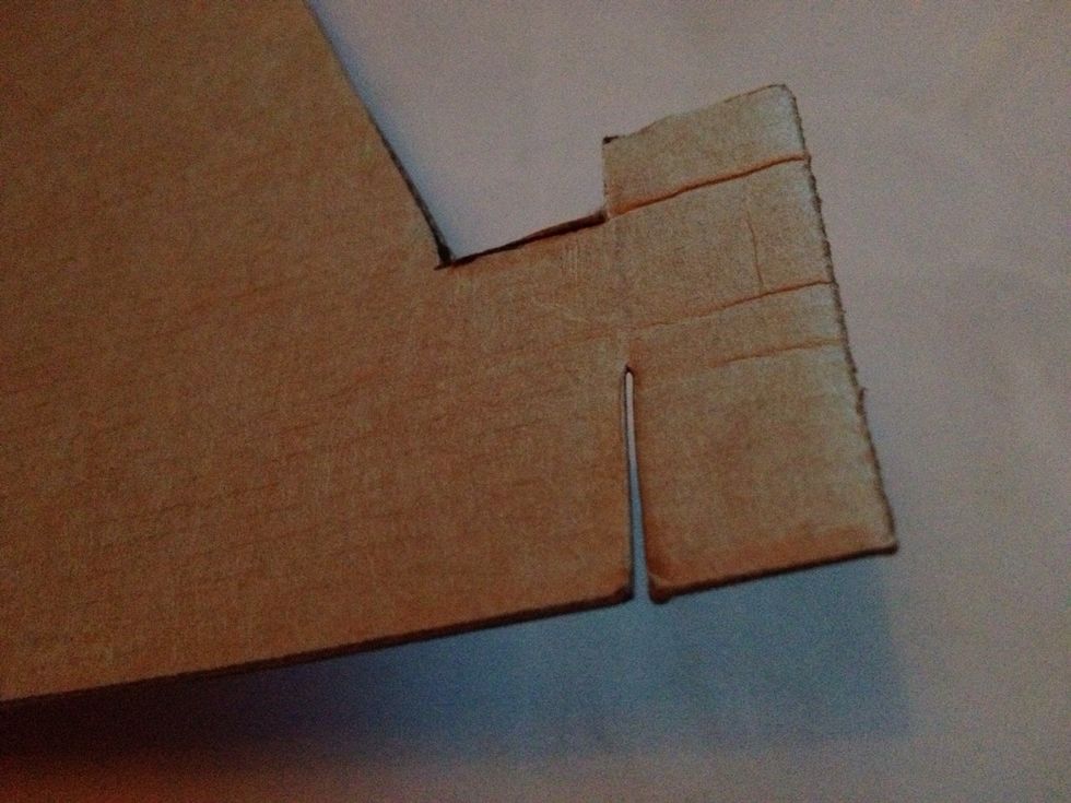 Make a small cut in the bottom of each side to add one piece of media at a later