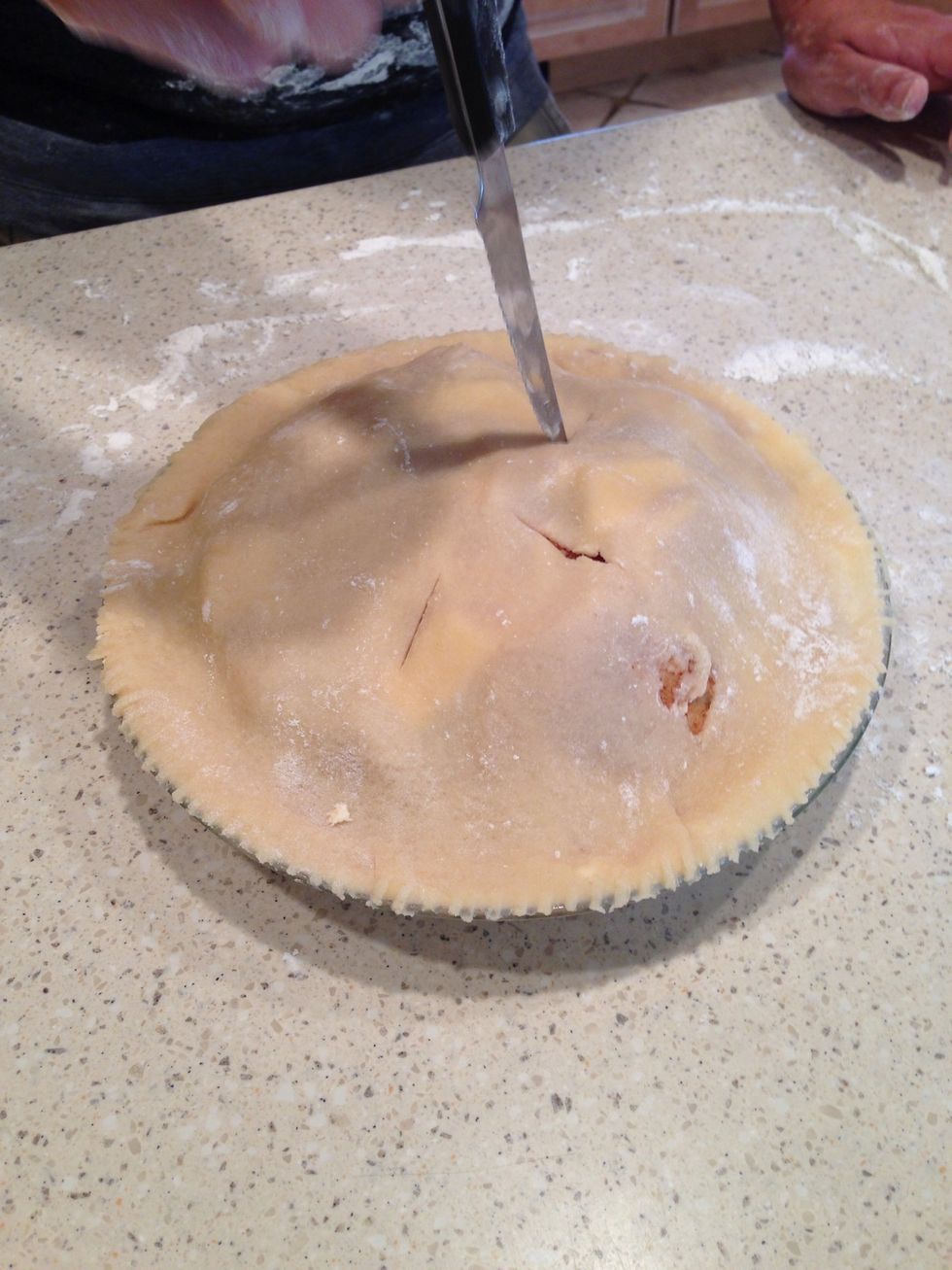 Make a small cut with the knife on the top to allow steam to leave the pie. It also looks fabulous