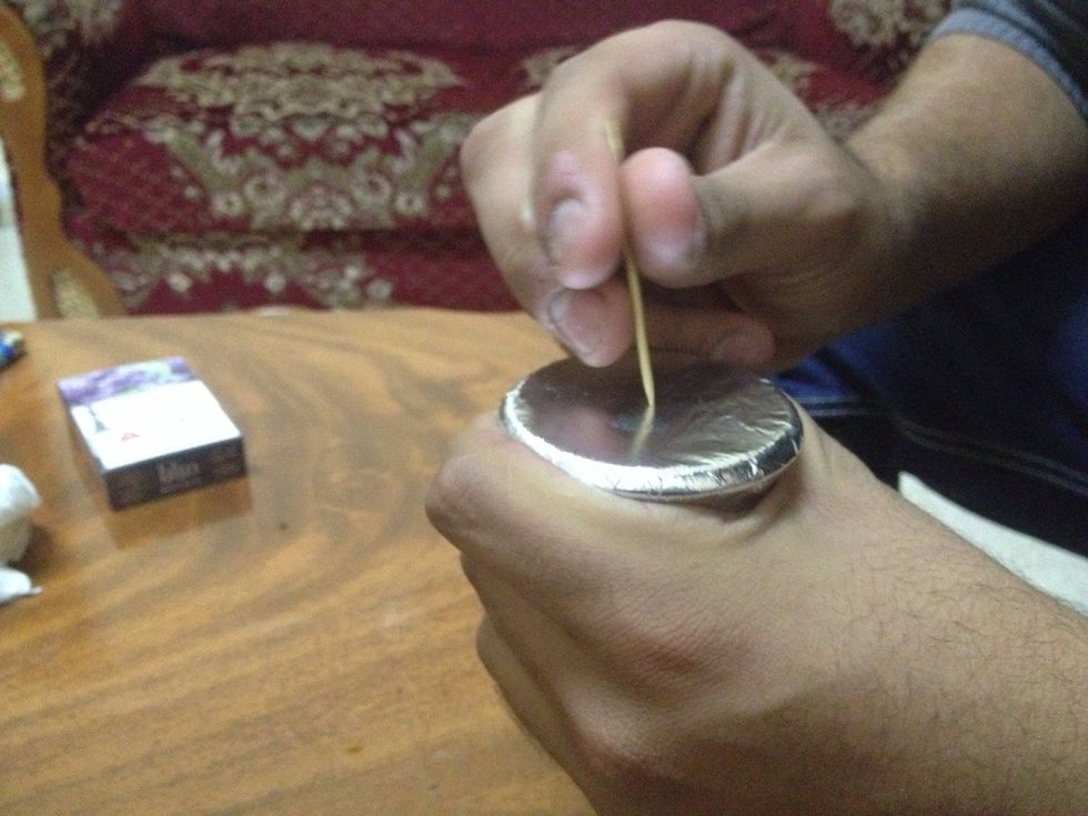 Make a small holes with the toothpick