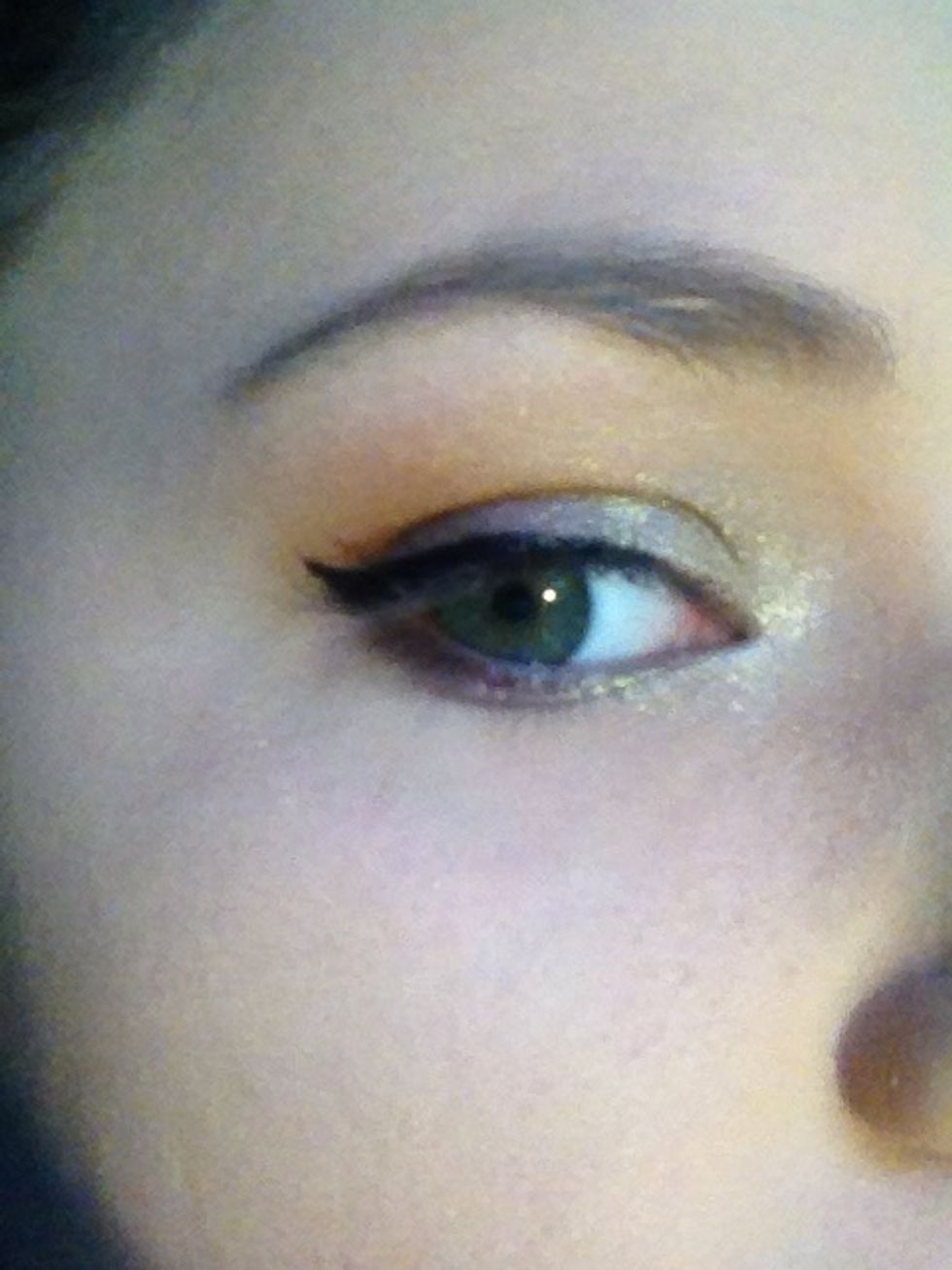 Make a small wing with liquid liner.