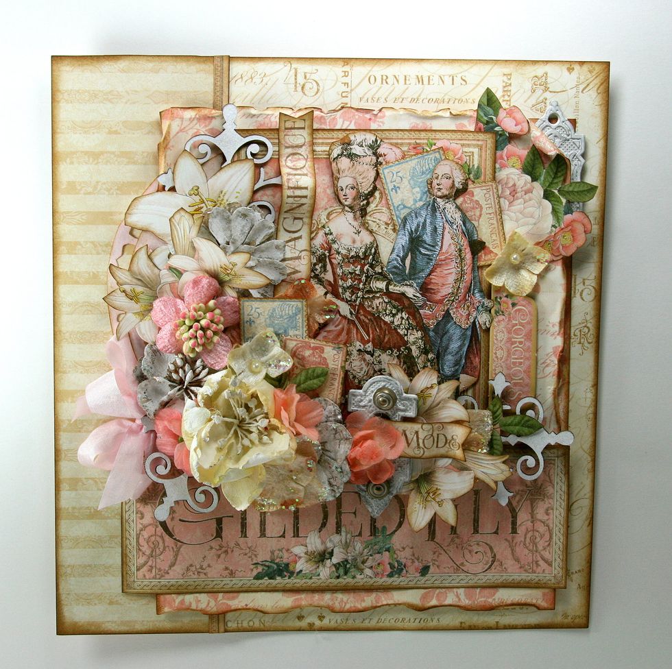 Make a smallish loopy bow from Pink Wrinkle Ribbon and attach just under the flowers on the left bottom corner. Use a chopstick or small tool to get it firmly under the arrangement.