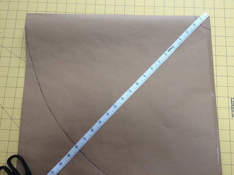 Make a template by folding the paper in half