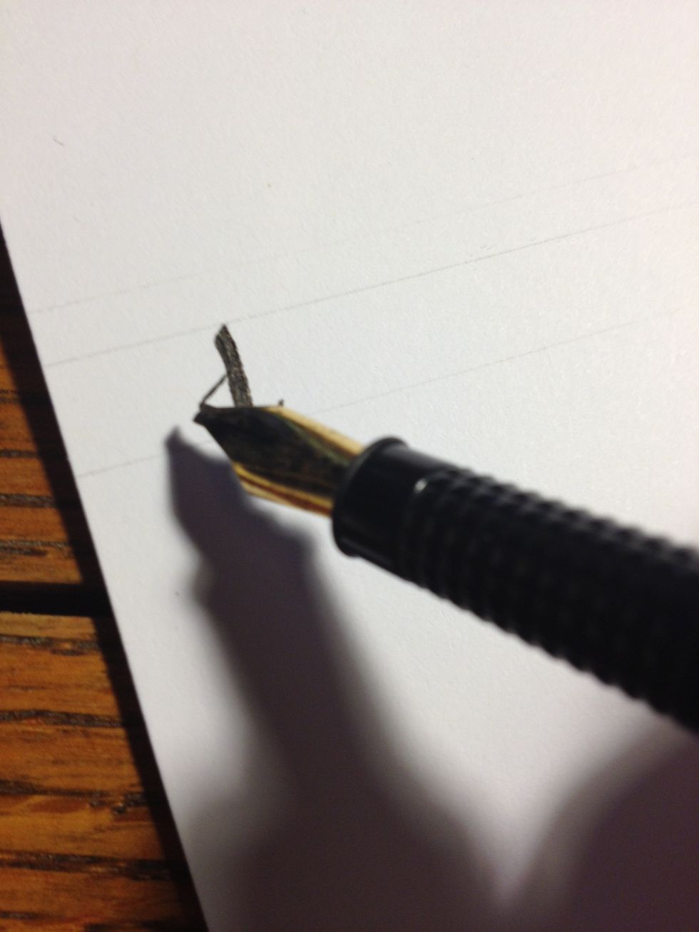 Make a thin downwards diagonal line from about halfway up the trunk.