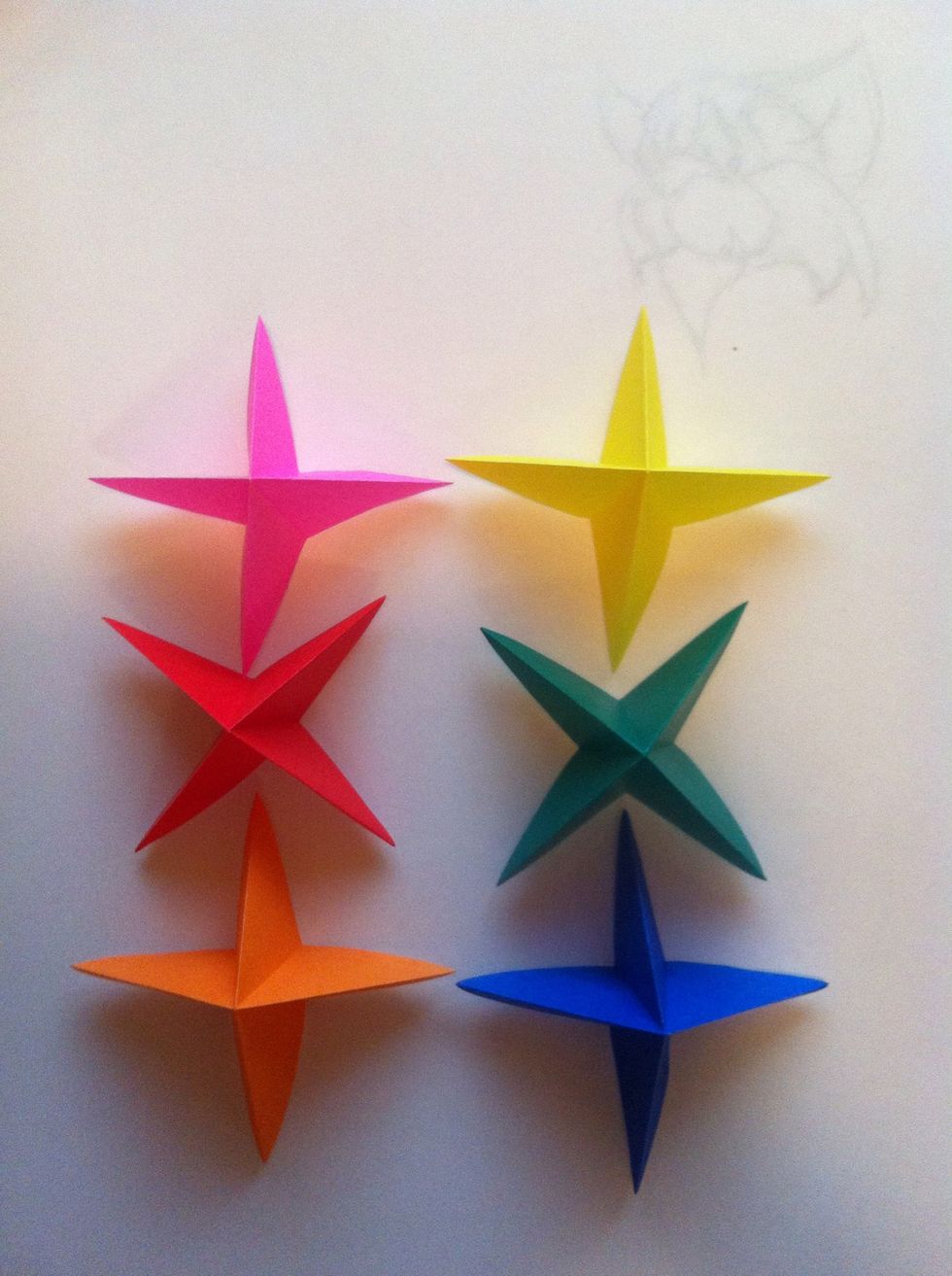 Make a total of 6 & open them into an "x" shape.