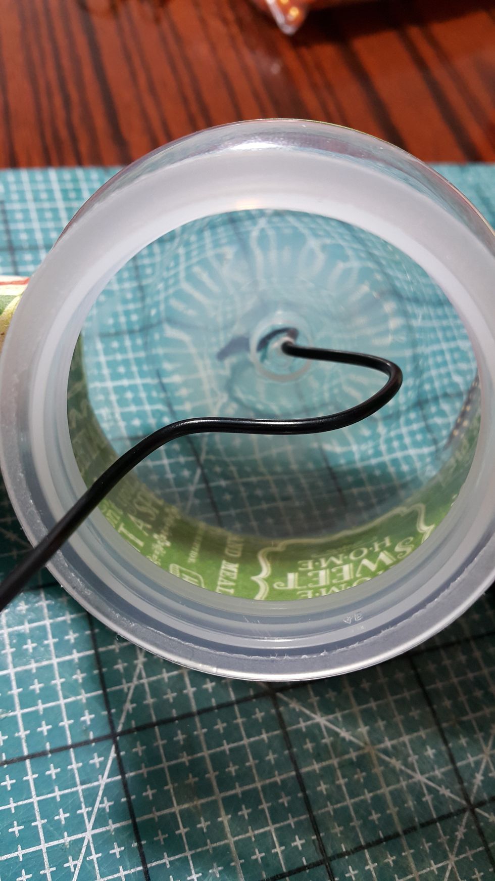 Make a turn of the black wire, so the beads putting inside can be moved when you turn