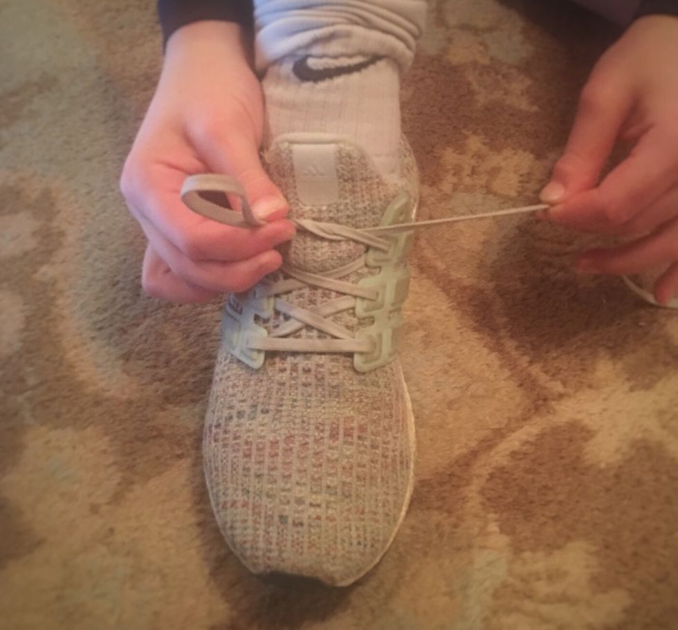 Make a \u201cbunny ear\u201d with your finger.