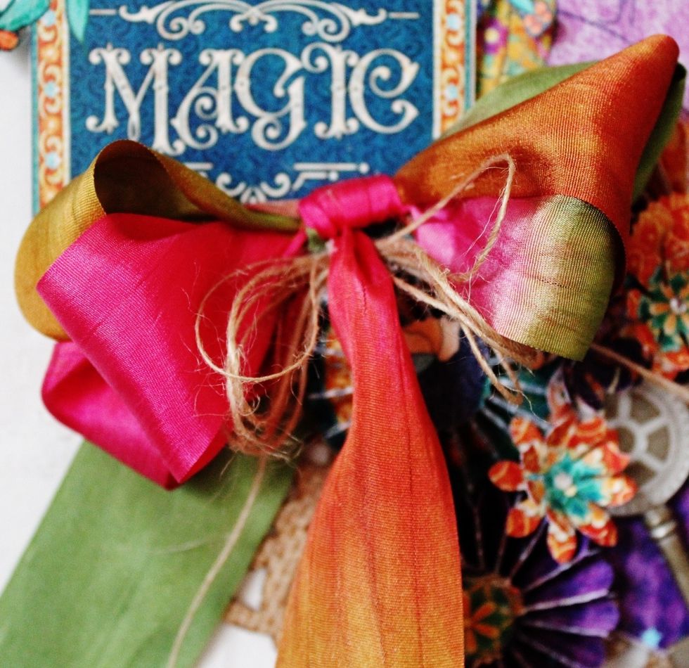 Make a variegated bow; adhere to front.