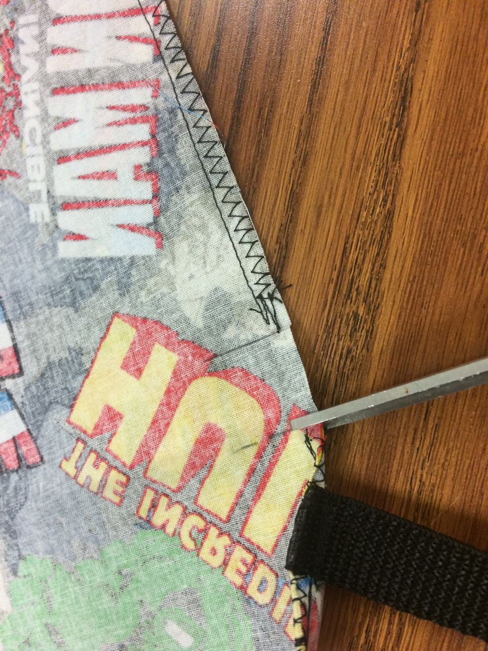 Make a VERY SMALL cut along the lines - cut as far as the stitch line. maybe 1/4 inch