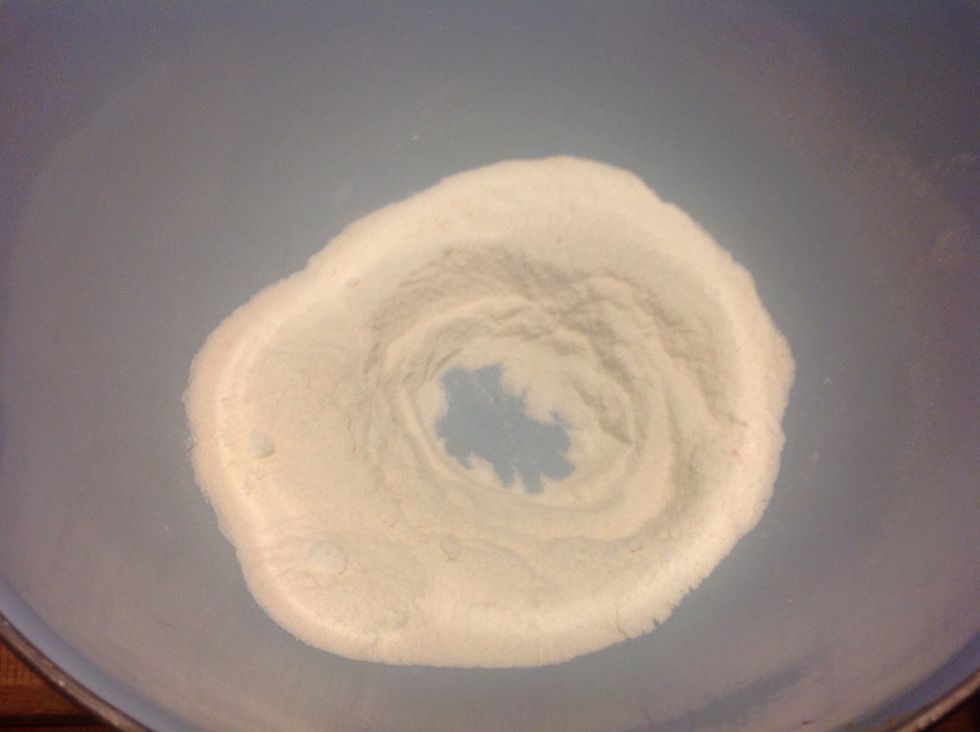Make a well in the centre of the dry ingredients.