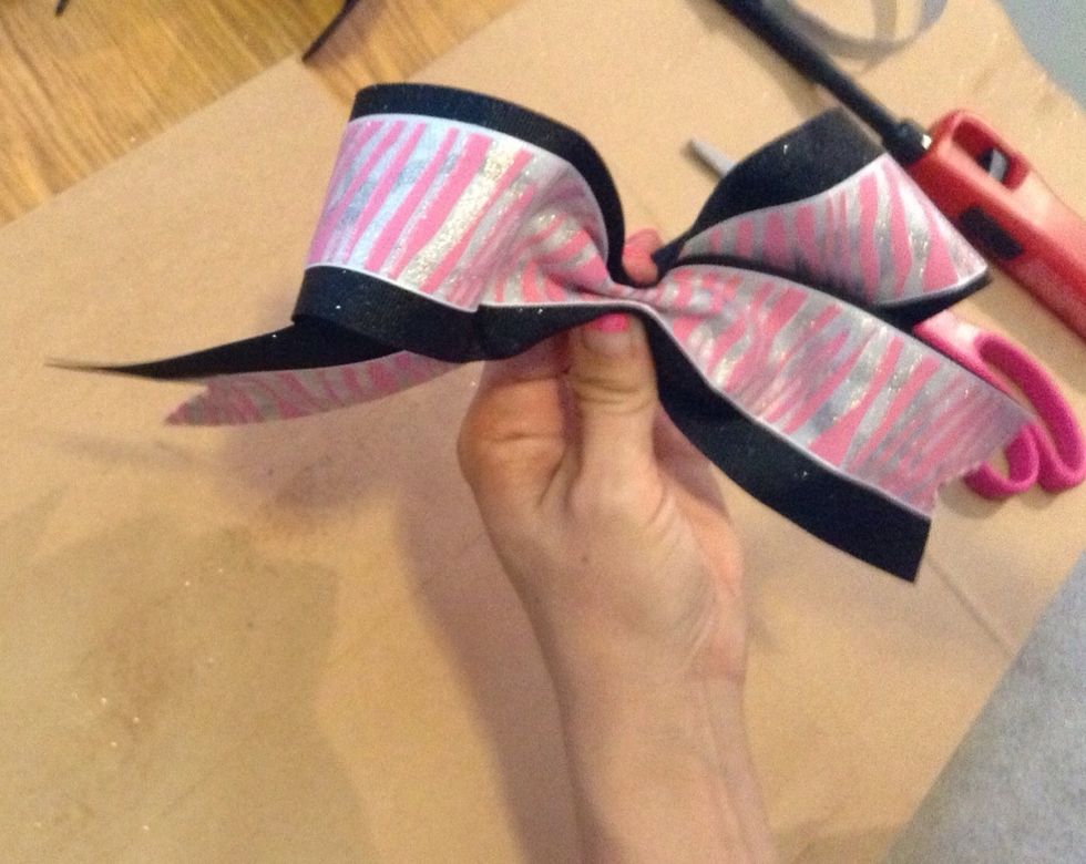 Make an accordian like fold from top to bottom so that you have your desired look.