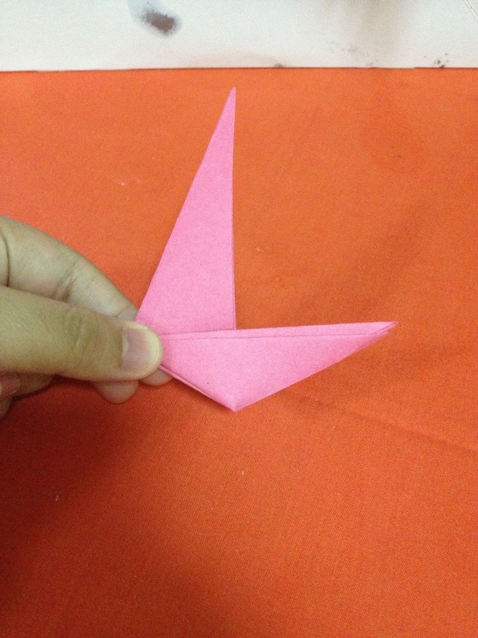 Make an inside-out fold. Like a hoodie.