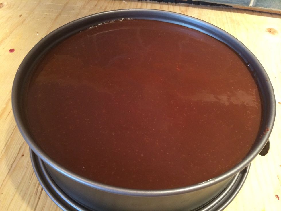 Make another batch of the chocolate fudge by following steps 5-7 again. Pour it onto the cake and then put it in the fridge to cool. The cake is now done.