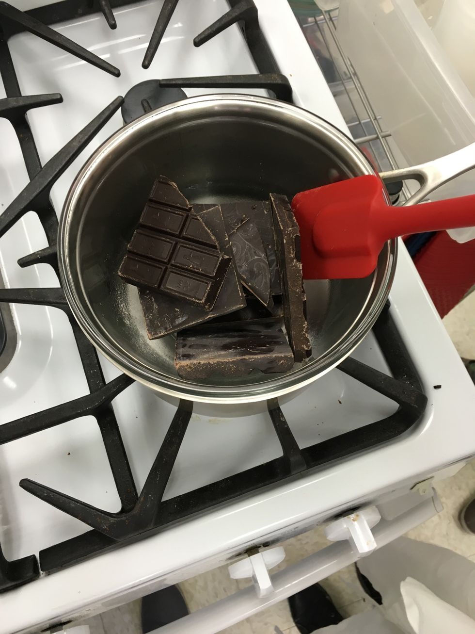 Make another double boiler to melt the chocolate.