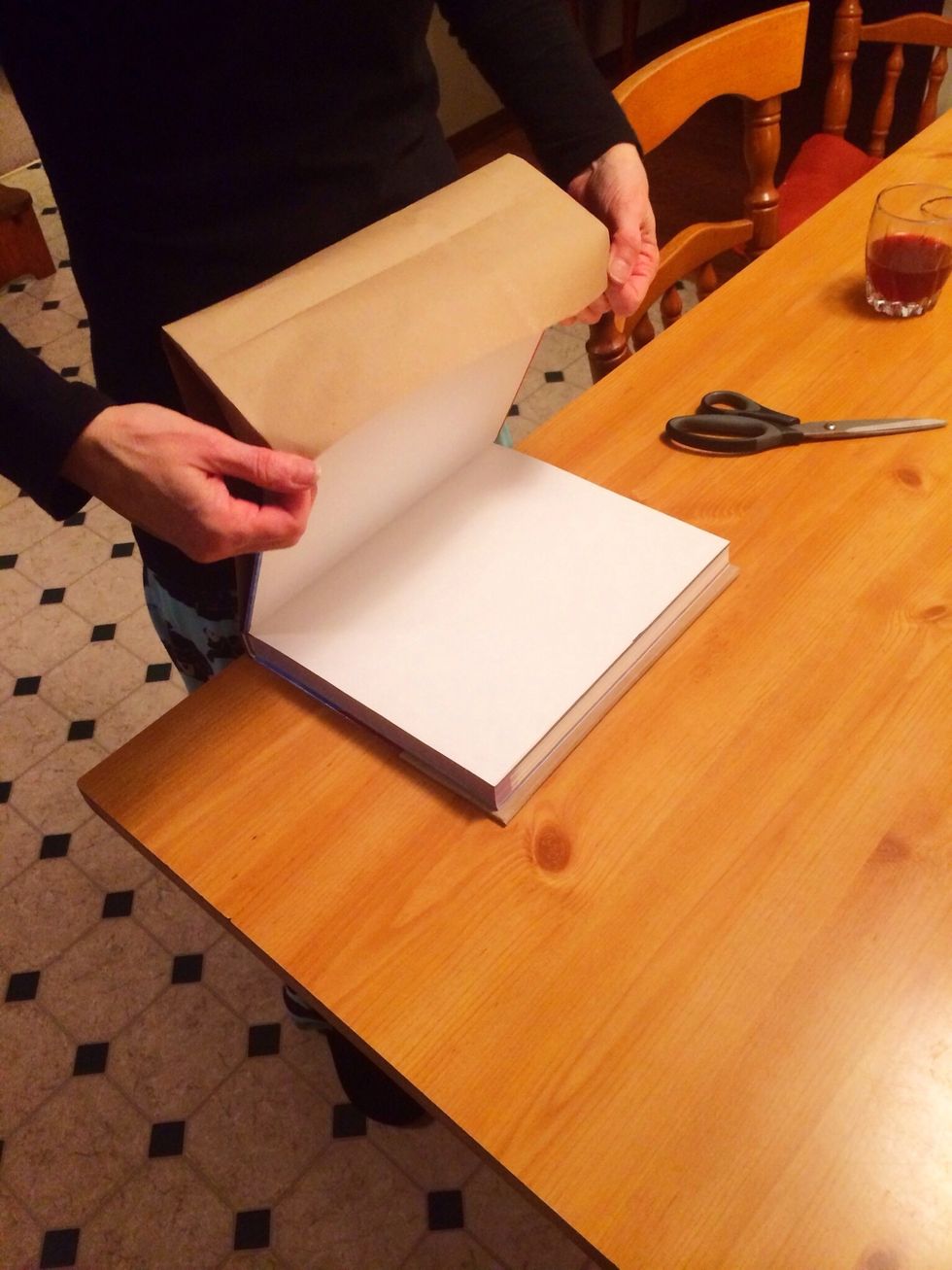 Make another envelope and put the back cover into the bag.