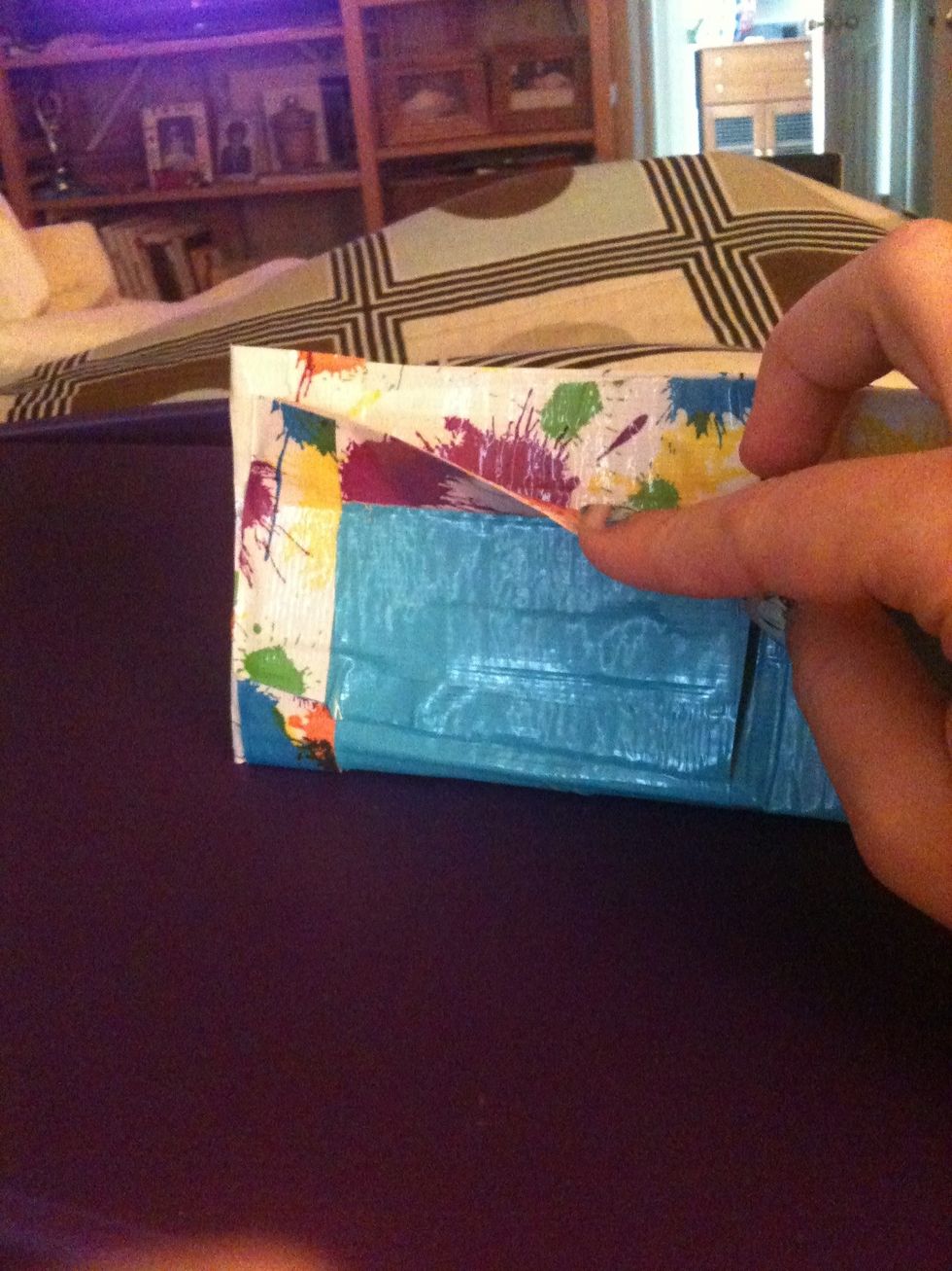 Make another pocket if you like. This one I made the same color as my wallet so you can't see it or the other one. This one opens on the top. I like to alternate opening on the top and side.