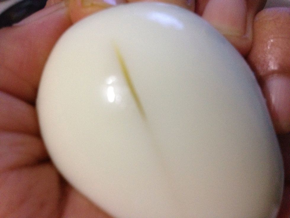 Make around 4-5 slits on each egg. Do not go too deep or it would split.